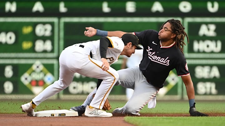 Sep 7, 2024; Pittsburgh, Pennsylvania, USA; Washington Nationals left fielder James Wood (29) steals second base against Pittsburgh Pirates second baseman Alika Williams (25) during the first inning of the second game of a double header at PNC Park.