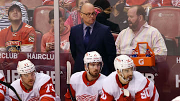 Mar 5, 2022; Sunrise, Florida, USA; Detroit Red Wings head coach Jeff Blashill looks on during the second period against the Florida Panthers at FLA Live Arena. Mandatory Credit: Jim Rassol-Imagn Images