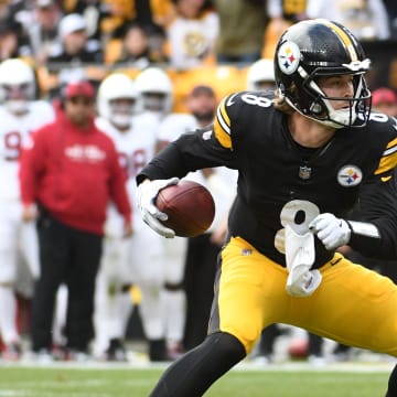 Dec 3, 2023; Pittsburgh, Pennsylvania, USA;  Pittsburgh Steelers quarterback Kenny Pickett (8) plays the ball against the Arizona Cardinals during the second quarter at Acrisure Stadium. Mandatory Credit: Philip G. Pavely-USA TODAY Sports