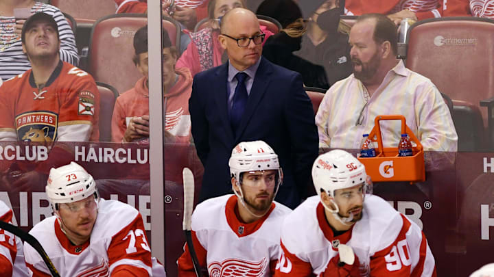 Mar 5, 2022; Sunrise, Florida, USA; Detroit Red Wings head coach Jeff Blashill looks on during the second period against the Florida Panthers at FLA Live Arena. Mandatory Credit: Jim Rassol-Imagn Images