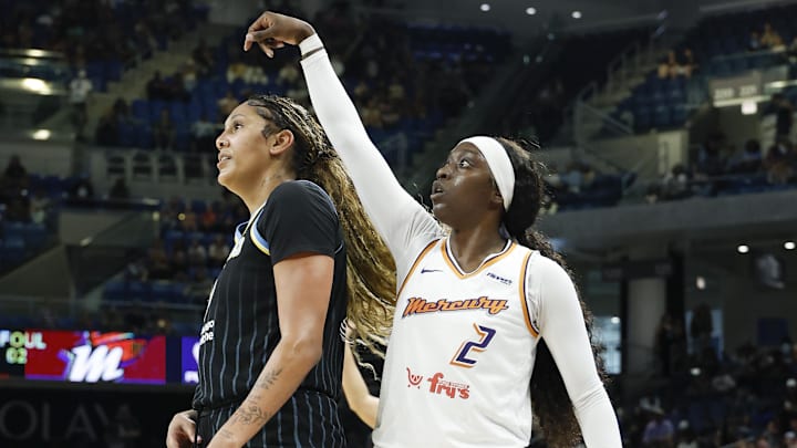 Aug 3, 2025; Chicago, Illinois, USA; Phoenix Mercury guard Kahleah Copper (2) reacts after scoring against Chicago Sky center Kamilla Cardoso (10) during the first half at Wintrust Arena. Mandatory Credit: Kamil Krzaczynski-Imagn Images