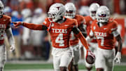 Texas Longhorns defensive back Andrew Mukuba celebrates an interception this season. The Longhorns will face Texas A&M in the resumption of their rivalry this week.