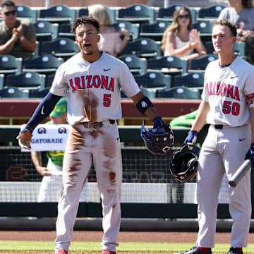 Arizona Wildcats Chase Davis (5) reacts after Garen Caulfield (1) hit a two-run home run against the Oregon Ducks in the second inning during the Pac-12 Baseball Tournament at Scottsdale Stadium on May 25, 2022.