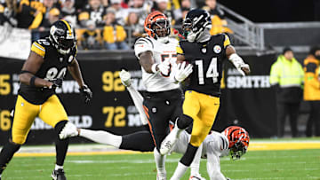 Dec 23, 2023; Pittsburgh, Pennsylvania, USA;  Pittsburgh Steelers wide receiver George Pickens outpaces the Cincinnati Bengals defense for an 86 yard touchdown in the first quarter at Acrisure Stadium. Mandatory Credit: Philip G. Pavely-Imagn Images