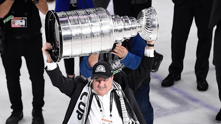 Jul 7, 2021; Tampa, Florida, USA; Tampa Bay Lightning owner Jeff Vinik hoists the Stanley Cup after the Lightning defeated the Montreal Canadiens 1-0 in game five to win the 2021 Stanley Cup Final at Amalie Arena. Mandatory Credit: Douglas DeFelice-Imagn Images