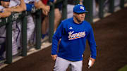 Kansas Jayhawks' Head Coach Dan Fitzgerald exchanges words with the officials before being ejected from the game in sixth inning of the Longhorns' game against the Kansas Jayhawks, Thursday, May 16, 2024 at UFCU Disch-Falk Field in Austin.
