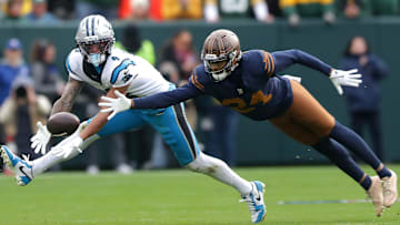 Green Bay Packers cornerback Carrington Valentine (24) breaks up a pass to Carolina Panthers wide receiver Tetairoa McMillan (4) on Sunday, November 2, 2025, at Lambeau Field in Green Bay, Wis. Carolina defeated Grewen Bay 16-13.
Wm. Glasheen USA TODAY NETWORK-Wisconsin