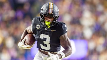 Quincy Skinner Jr. 3 scores a touchdown as the LSU Tigers take on the Vanderbilt Commodores. Nov 23, 2024; Baton Rouge, Louisiana, USA; at Tiger Stadium.
