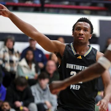Huntington Prep guard Darryn Peterson signals for possession of the ball against Richmond Heights during the first half of a basketball game in the Canton Play-By-Play Classic at Canton Memorial Field House, Saturday, Feb. 17, 2024, in Canton, Ohio.