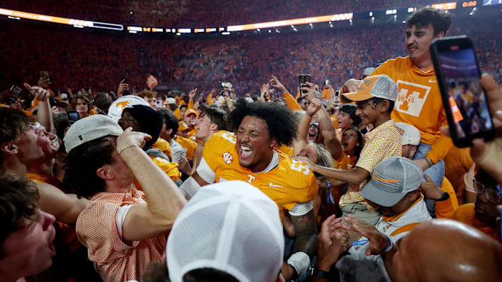 Oct 19, 2024; Knoxville, Tennessee, USA; Tennessee Volunteers defensive lineman Daevin Hobbs (53) celebrates with fans after defeating the Alabama Crimson Tide at Neyland Stadium. Mandatory Credit: Alan Poizner-Imagn Images