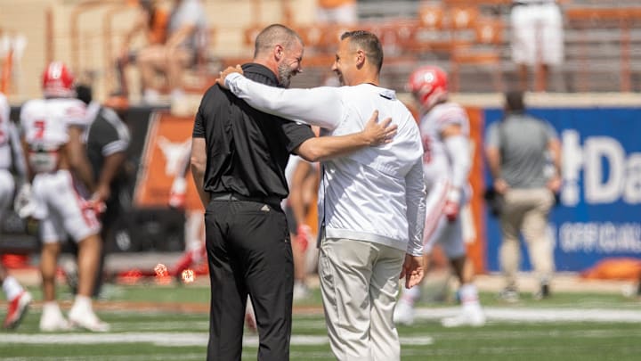 Louisiana head coach Billy Napier, left, greets Texas head coach Steve Sarkisian before the game at Royal-Memorial Stadium on Saturday, September 4, 2021.
