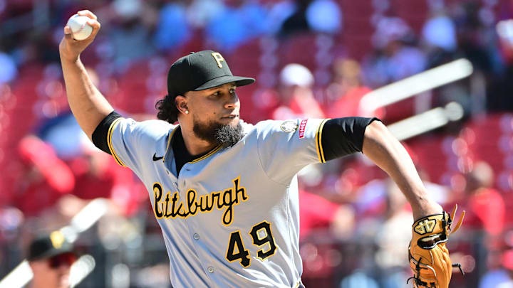 Aug 28, 2025; St. Louis, Missouri, USA; Pittsburgh Pirates pitcher Yohan Ramirez (49) throws in relief against the St. Louis Cardinals at Busch Stadium. Mandatory Credit: Tim Vizer-Imagn Images