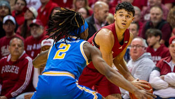 Indiana's Anthony Leal (3) looks to pass around UCLA's Dylan Andrews (2) during the Indiana versus UCLA men's basketball game at Simon Skjodt Assembly Hall on Friday, Feb. 14, 2025.