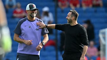 Jurgen Klopp, left, tackled Roberto De Zerbi in the Premier League