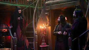 “WHAT WE DO IN THE SHADOWS” -- “Sleep Hypnosis” -- Season 6, Episode 3 (Airs October 21) — Pictured (L-R): Natasia Demetriou as Nadja, Kayvan Novak as Nandor, Matt Berry as Laszlo
