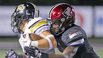 Ft. Payne  s Nolan Fowler makes a catch as Gadsden City  s Zyan Gibson defends during high school football action in Gadsden, Alabama September 15, 2023. (Dave Hyatt: The Gadsden Times)