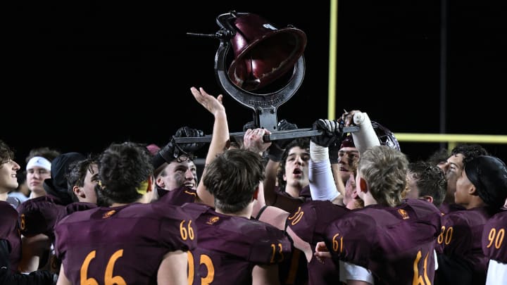 Walsh Jesuit players celebrate a win over St. Vincent-St. mary on October 21, 2022. The two teams will both join the Ohio Catholic Athletic Conference for football in 2026.