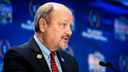 Dec 31, 2024; Atlanta, Georgia, USA; Peach Bowl President and CEO Gary P. Stokan addressed the gathered media ahead of the Joint head coaches Press Conference at the Westin Peachtree Plaza in Atlanta, Georgia on Dec. 31, 2024, ahead of the Peach Bowl College Football Quarterfinal Game on New Years Day. Texas Longhorns head coach Steve Sarkisian joined Arizona State Sun Devils head coach Kenny Dillingham at the press conference.  Mandatory Credit: Sara Diggins/USA TODAY Network via Imagn Images 