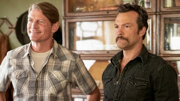 NCIS: Origins – Pictured (L-R): Philip Winchester as Mason Franks and Kyle Schmid as Mike Franks. Photo: Erik Voake/CBS ©2025 CBS Broadcasting, Inc. All Rights Reserved.