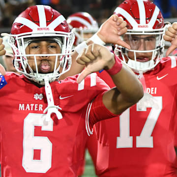 Mater Dei football players gesture during a game against Bishop Gorman in last fall's big nationally-ranked matchup.