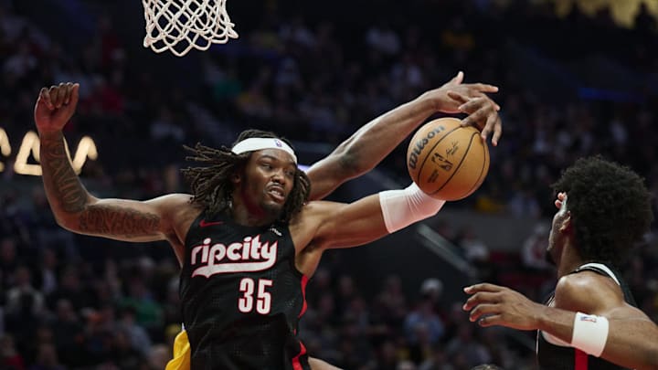 Feb 20, 2025; Portland, Oregon, USA; Portland Trail Blazers center Robert Williams III (35) grabs a rebound during the second half against the Los Angeles Lakers at Moda Center. Mandatory Credit: Troy Wayrynen-Imagn Images