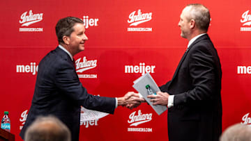 Indiana University Vice President and Director of Intercollegiate Athletics Scott Dolson introduces new men's basketball Head Coach Darian DeVries at the introductory press conference at Simon Skjodt Assembly Hall on Wednesday, March 19, 2025.