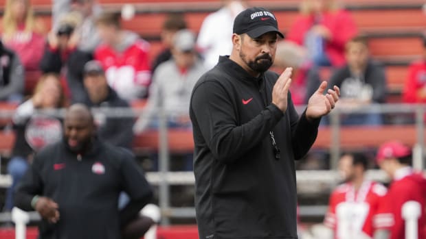 Ohio State Buckeyes head coach Ryan Day watches warm-ups prior to the NCAA football game against the Rutgers Scarlet Knights 