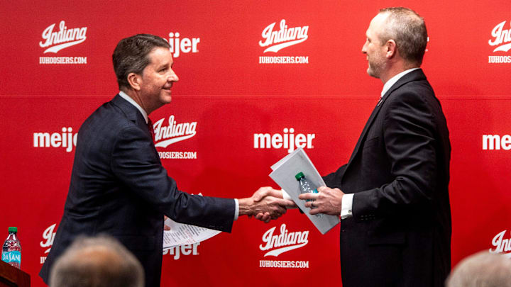 Indiana University Vice President and Director of Intercollegiate Athletics Scott Dolson introduces new men's basketball Head Coach Darian DeVries at the introductory press conference at Simon Skjodt Assembly Hall on Wednesday, March 19, 2025.