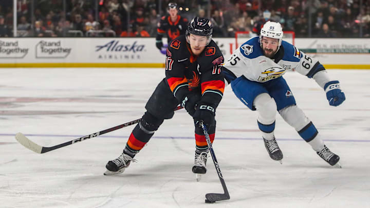 Coachella Valley forward Max McCormick (17) skates under pressure from Colorado forward Cedric Pare (65) during the first period of their game at Acrisure Arena in Palm Desert, Calif., Wednesday, May 3, 2023. Coachella Valley forward Max McCormick (17) skates under pressure from Colorado forward Cedric Pare (65) during the first period of their game at Acrisure Arena in Palm Desert, Calif., Wednesday, May 3, 2023.