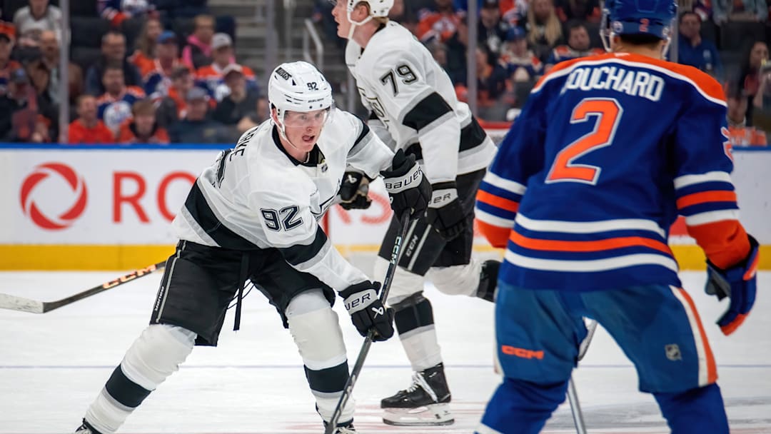 Brandt Clarke (number 92) and Evan Bouchard (number 2)