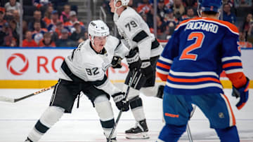 Brandt Clarke (number 92) and Evan Bouchard (number 2)