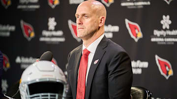 Arizona Cardinals' new general manager Monti Ossenfort listens as team owner Michael Bidwill