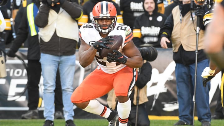 Jan 8, 2023; Pittsburgh, Pennsylvania, USA;  Cleveland Browns running back Nick Chubb (24) scores a touchdown against the Pittsburgh Steelers during the fourth quarter at Acrisure Stadium.