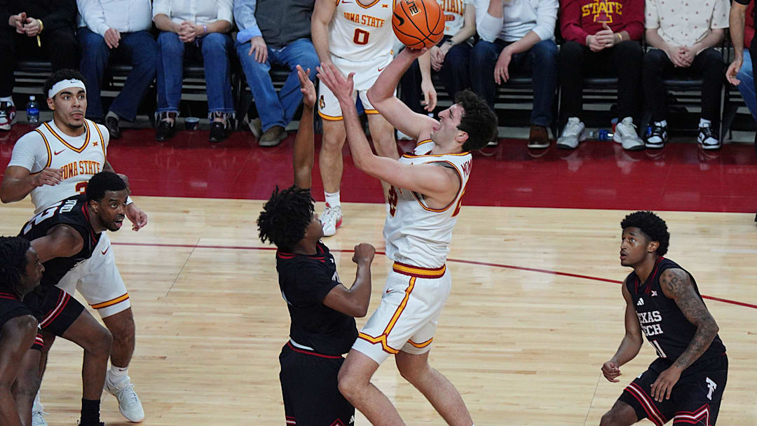 Iowa State Cyclones forward Milan Momcilovic (22) shoots the ball over Texas Tech Red Raiders forward Josiah Moseley (5) during the second half in the Big-12 conference men’s basketball showdown on Feb. 28, 2026, at Hilton Coliseum in Ames, Iowa.