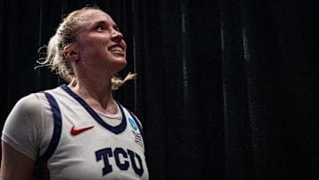 TCU Horned Frogs guard Hailey Van Lith celebrates as she heads to the locker room after the Sweet 16 win over Notre Dame. 