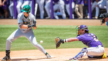 Catcher Hayden Travinski 25 working behind the plate as The LSU Tigers take on Tulane in the first round of the 2023 NCAA Div 1 Baseball Championship at Alex Box Stadium in Baton Rouge, LA. Friday, June 2, 2023.