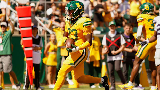 Baylor Bears running back Michael Turner (23) runs for a touchdown against the Kansas State Wildcats 