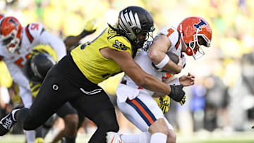 Matayo Uiagalelei sacks Illinois quarterback Luke Altmyer in a 38-9 win last October. Mandatory Credit: Troy Wayrynen-Imagn Images