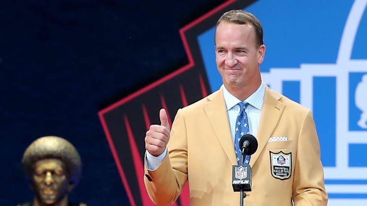 Peyton Manning was enshrined in the Pro Football Hall of Fame at Tom Benson Hall of Fame Stadium on Sunday, August 8, 2021. Manning was presented by father Archie Manning.