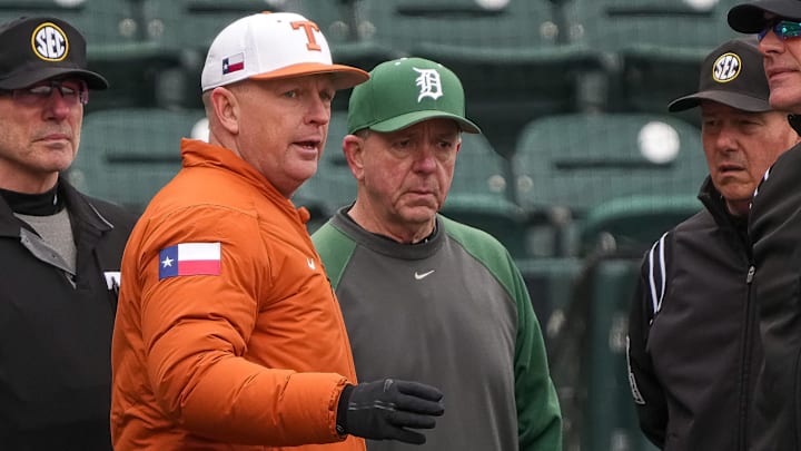 Texas Longhorns head coach Jim Schlossnagle talks to Dartmouth head coach Bob Whalen ahead of the game at UFCU Disch-Falk Field on Friday, Feb. 21, 2025.
