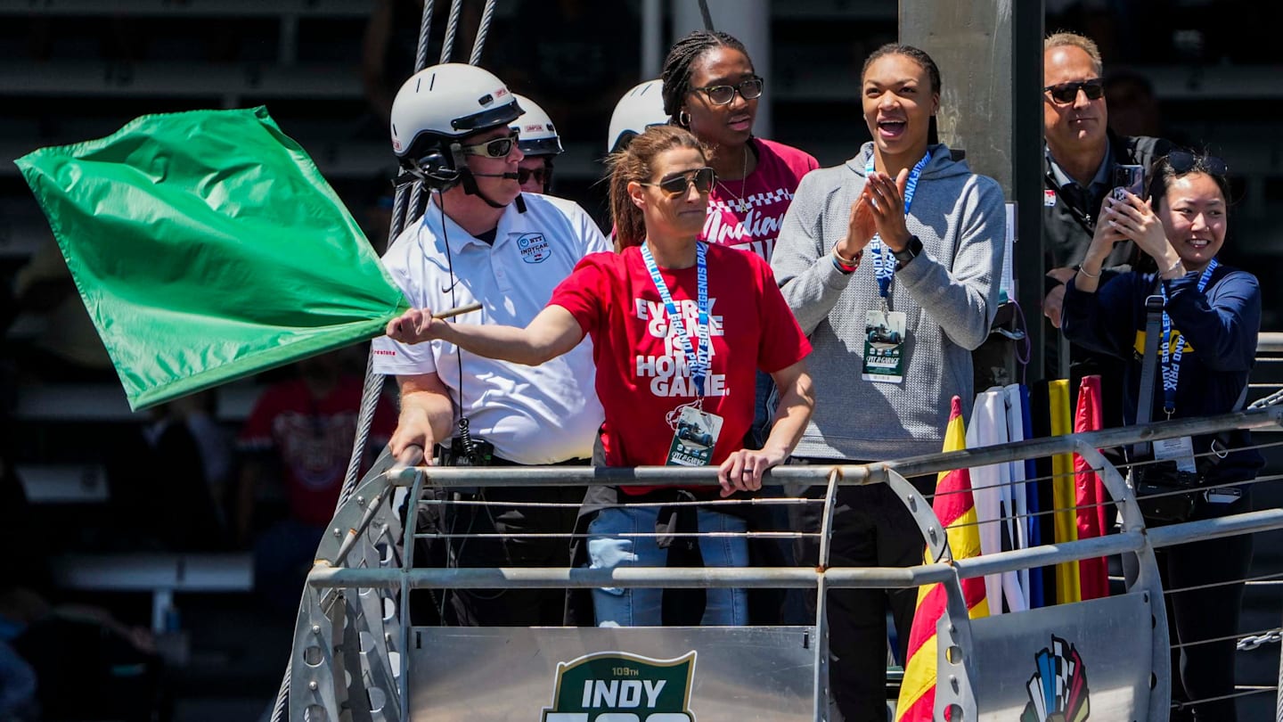 Purdue Legend Fever Coach Stephanie White Waves Green Flag at Indy 500