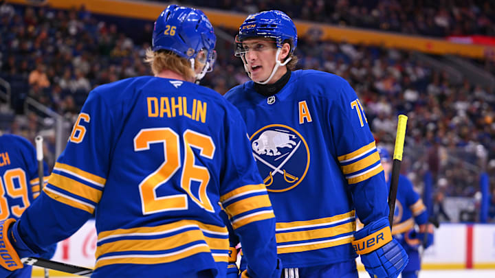Buffalo Sabres alternate captain Tage Thompson talks to captain Rasmus Dahlin