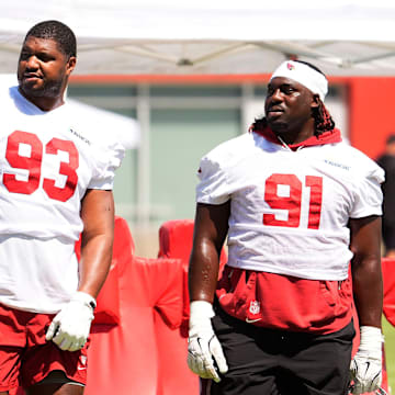 Arizona Cardinals defensive linemen Calais Campbell (93) and L.J. Collier (91) during minicamp at Cardinals training center in Tempe on June 12, 2025.