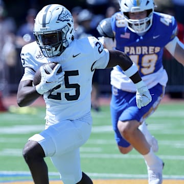 St. John Bosco sophomore Maliq Allen on way to a 62-yard touchdown run in the first quarter in nonleague game at Serra on 9/14/2024