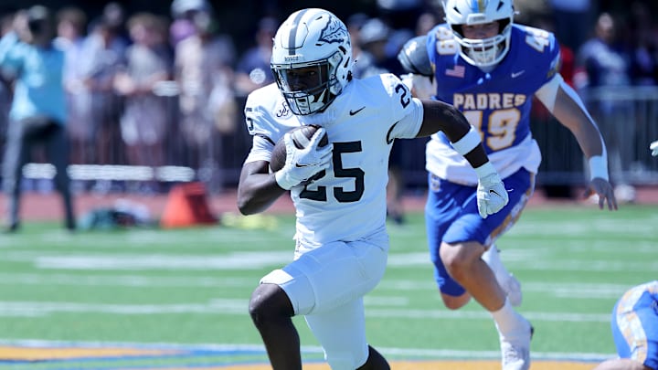 St. John Bosco sophomore Maliq Allen on way to a 62-yard touchdown run in the first quarter in nonleague game at Serra on 9/14/2024