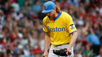 Boston Red Sox pitcher Dustin May celebrates after striking out the side against the Pittsburgh Pirates.