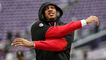 Falcons quarterback Michael Penix Jr. warms up before a game against the Minnesota Vikings.