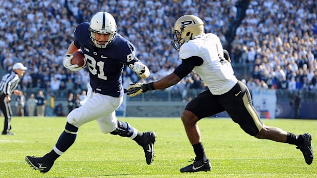 Penn State tight end Adam Breneman runs with the football after a catch against Purdue in a 2013 game at Beaver Stadium. 