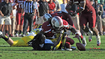South Carolina football star Jadeveon Clowney delivered the most iconic hit in the history of football against Michigan.