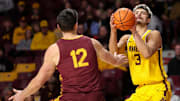 Minnesota Golden Gophers forward Dawson Garcia (3) shoots as Bethune-Cookman Wildcats forward Jesus Carralero Martin (12) defends during the first half at Williams Arena.